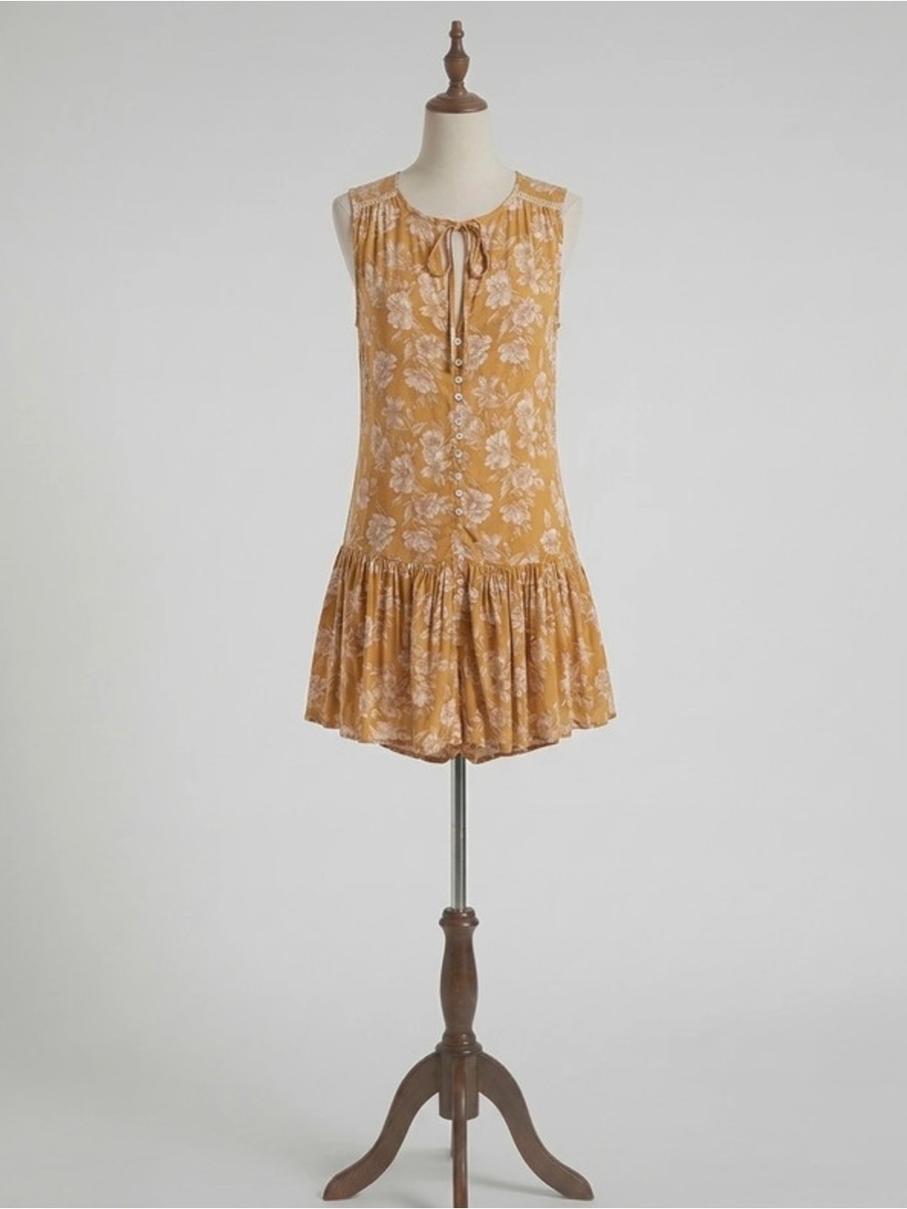 Sleeveless Mustard Floral Tie-Neck Romper